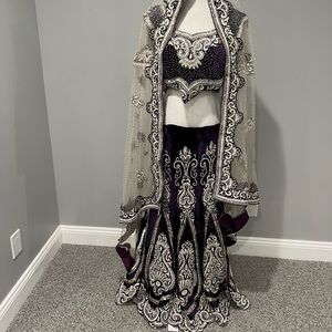 Purple heavy stonework lehenga